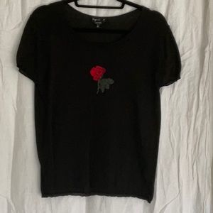 Agnes B silk cotton black blouse with central rose on chest. Size 2